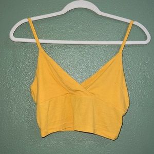 yellow tank top